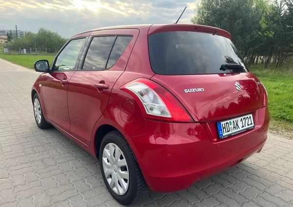 Suzuki Swift cena 23499 przebieg: 143979, rok produkcji 2012 z Czersk małe 631